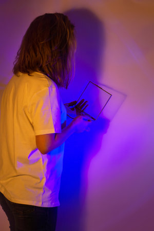 Blend of the future innovation and the trendy ambiance of the neon lights captures the essence of the contemporary our lifestyle. Future of work and innovative neon tech.の写真素材