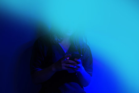 Girl with interface or a digital screen in virtual reality. Virtual interface and manipulating...