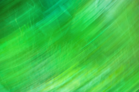 Green defocused dynamic abstract background. long time exposure motion blurの写真素材