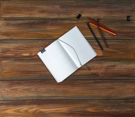 Notebook mockup background for design. Top view shooting. Mock up poster sketchpad frame.の写真素材
