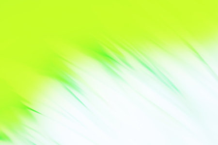 Fresh spring green grass with green bokeh. Field of grass at sunset bokeh background and sunlightの写真素材