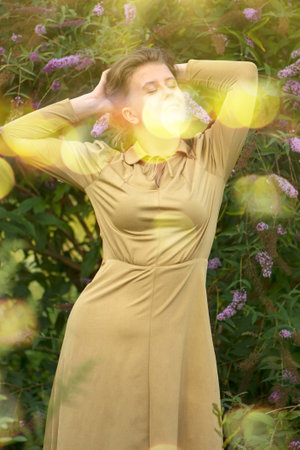 Young graceful happy smiling lady enjoying life. Happy emotional woman enjoying life.の写真素材