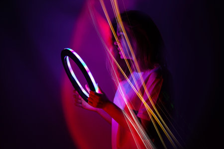 Amazed surprised blogger content creator got many likes on video content. Content marketing or social media professional.の写真素材