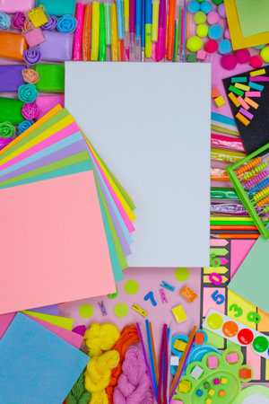 Blank canvas stretched on stretcher bar with empty blank space. Art supplies and educational materials on pink bright background.の写真素材