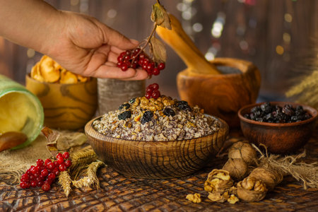 Traditional kutia and spices in Ukraine. Warm rustic still life shows Christmas celebration of...