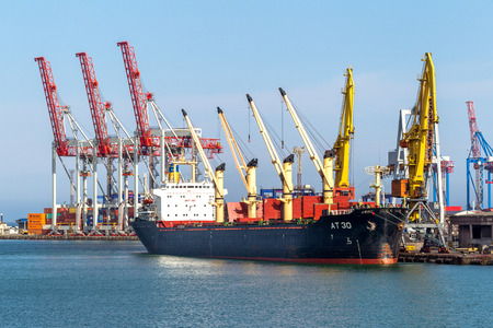 ODESSA, UKRAINE - APRIL 15: maritime cargo ship moored in the harbor of Odessa sea port . Loading and unloading are carried out works of Ukrainian industrial goods, April 15, 2014 Odessa, Ukraineのeditorial素材