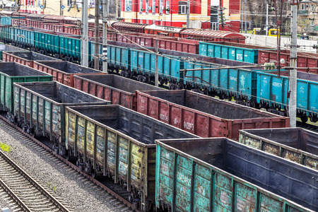 Coal , metal, iron square tube is transported in railway train marshalling yardのeditorial素材
