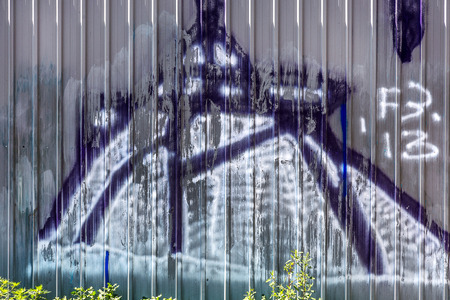 Beautiful street art graffiti. Abstract creative drawing fashion colors on the walls of the city. Urban Contemporary Cultureのeditorial素材