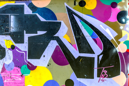 Beautiful street art graffiti. Abstract creative drawing fashion colors on the walls of the city. Urban Contemporary Cultureのeditorial素材