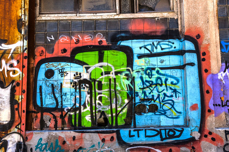 Beautiful street art graffiti. Abstract creative drawing fashion colors on the walls of the city. Urban Contemporary Cultureのeditorial素材