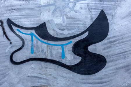 Beautiful street art graffiti. Abstract creative drawing fashion colors on the walls of the city. Urban Contemporary Cultureの写真素材