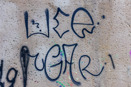 Beautiful street art graffiti. Abstract creative drawing fashion colors on the walls of the city. Urban Contemporary Cultureの写真素材