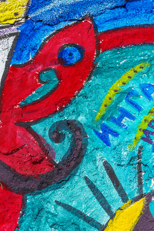 Beautiful street art graffiti. Abstract creative drawing fashion colors on the walls of the city. Urban Contemporary Cultureの写真素材