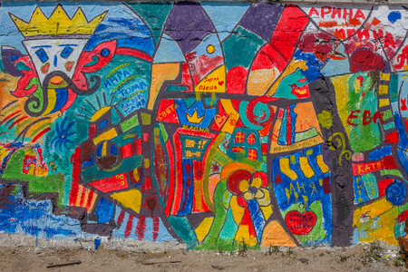 Beautiful street art graffiti. Abstract creative drawing fashion colors on the walls of the city. Urban Contemporary Cultureの写真素材