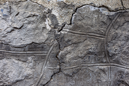 Beautiful old wall with large cracks and texture. Can be used as backgroundの写真素材