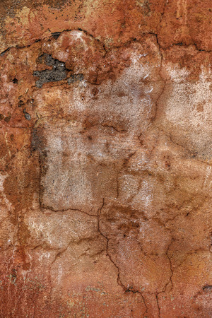 Beautiful old wall with large cracks and texture. Can be used as backgroundの写真素材