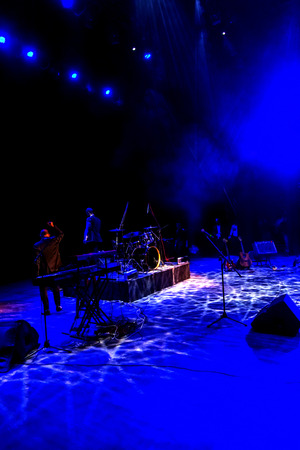 Stage lights. Several projectors in the dark. Multi-colored light beams from the stage spotlights on...