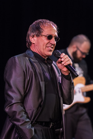 ODESSA, UKRAINE - Nov. 4, 2018: concert performance by Adriano Celentano. Soloist of the music group - Adolfo Sebastiani - famous singer, showman Celentano. Tribute Show Celentano. Italian pop legendのeditorial素材