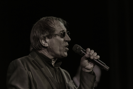 ODESSA, UKRAINE - Nov. 4, 2018: concert performance by Adriano Celentano. Soloist of the music group - Adolfo Sebastiani - famous singer, showman Celentano. Tribute Show Celentano. Italian pop legendのeditorial素材