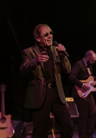ODESSA, UKRAINE - Nov. 4, 2018: concert performance by Adriano Celentano. Soloist of the music group - Adolfo Sebastiani - famous singer, showman Celentano. Tribute Show Celentano. Italian pop legendのeditorial素材