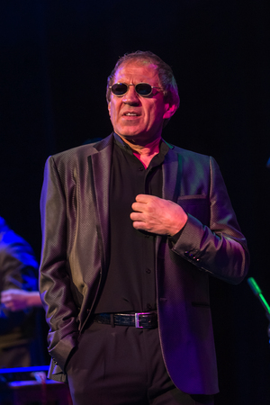 ODESSA, UKRAINE - Nov. 4, 2018: concert performance by Adriano Celentano. Soloist of the music group - Adolfo Sebastiani - famous singer, showman Celentano. Tribute Show Celentano. Italian pop legendのeditorial素材