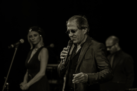 ODESSA, UKRAINE - Nov. 4, 2018: concert performance by Adriano Celentano. Soloist of the music group - Adolfo Sebastiani - famous singer, showman Celentano. Tribute Show Celentano. Italian pop legendのeditorial素材
