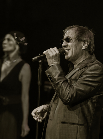 ODESSA, UKRAINE - Nov. 4, 2018: concert performance by Adriano Celentano. Soloist of the music group - Adolfo Sebastiani - famous singer, showman Celentano. Tribute Show Celentano. Italian pop legendのeditorial素材