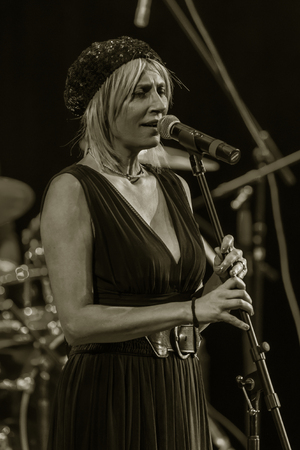 Odessa, Ukraine - November 4, 2018: Musical ensemble, jazz bands of team tribute to show Celentano on stage during creative light and musical show. Cheerful bright show in party clubのeditorial素材