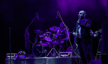 Odessa, Ukraine - November 4, 2018: Musical ensemble, jazz bands of team tribute to show Celentano on stage during creative light and musical show. Cheerful bright show in party clubのeditorial素材