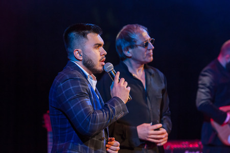 ODESSA, UKRAINE - Nov. 4, 2018: concert performance by Adriano Celentano. Soloist of the music group - Adolfo Sebastiani - famous singer, showman Celentano. Tribute Show Celentano. Italian pop legendのeditorial素材