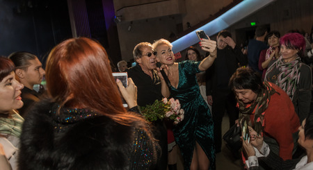 ODESSA, UKRAINE - Nov. 4, 2018: concert performance by Adriano Celentano. Soloist of the music group - Adolfo Sebastiani - famous singer, showman Celentano. Tribute Show Celentano. Italian pop legendのeditorial素材