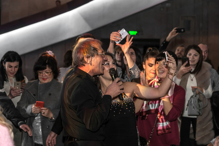 ODESSA, UKRAINE - Nov. 4, 2018: concert performance by Adriano Celentano. Soloist of the music group - Adolfo Sebastiani - famous singer, showman Celentano. Tribute Show Celentano. Italian pop legendのeditorial素材