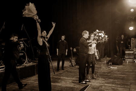 Odessa, Ukraine - November 4, 2018: Musical ensemble, jazz bands of team tribute to show Celentano on stage during creative light and musical show. Cheerful bright show in party clubのeditorial素材