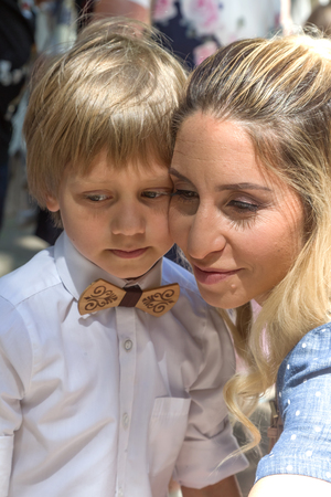 Odessa, Ukraine - May 31,2018: Children's musical group sing and dance on stage during graduation concert of elementary school. Children play. Emotional children's show on stage. Children's creativityのeditorial素材