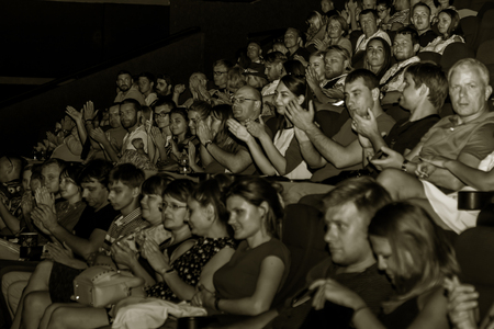 Odessa, Ukraine July 21 2917: Spectators watch a movie in the theater during an international film festival in Odessa. Spectators at a concert in the cinema watching the showのeditorial素材