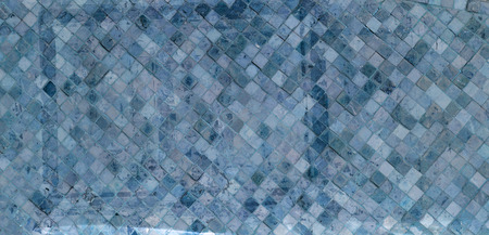 Colorful soft pastel monophonic Venetian mosaic as decorative decoration of facade. Venetian mosaic...