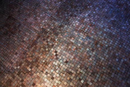 Colorful soft pastel monophonic Venetian mosaic as decorative decoration of facade. Venetian mosaic as decorative background. Selective focus. Abstract pattern. Abstract mosaic ceramic stonesの写真素材