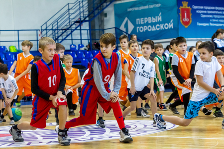 Odessa, Ukraine - December 23, 2018: young children play basketball, participate in children's sports competitions during celebration children's sports basketball club of children's sports schoolのeditorial素材