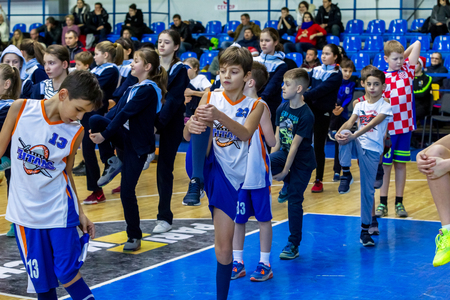Odessa, Ukraine - December 23, 2018: young children play basketball, participate in children's sports competitions during celebration children's sports basketball club of children's sports schoolのeditorial素材