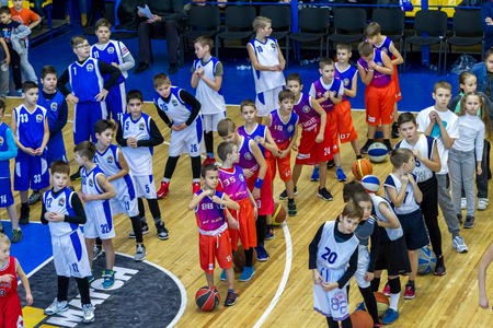 Odessa, Ukraine - December 23, 2018: young children play basketball, participate in children's sports competitions during celebration children's sports basketball club of children's sports schoolのeditorial素材