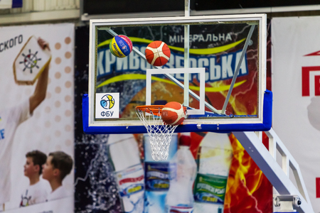 Odessa, Ukraine - December 23, 2018: basketball balls fly into the basketball basket during the celebration of the children's sports basketball club of the children's sports schoolのeditorial素材