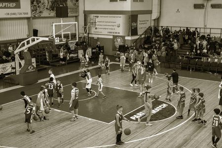 Odessa, Ukraine - December 23, 2018: young children play basketball, participate in children's sports competitions during celebration children's sports basketball club of children's sports schoolのeditorial素材