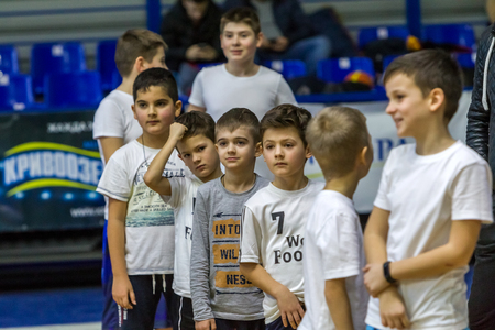 Odessa, Ukraine - December 23, 2018: young children play basketball, participate in children's sports competitions during celebration of children's sports basketball club of children's sports schoolのeditorial素材