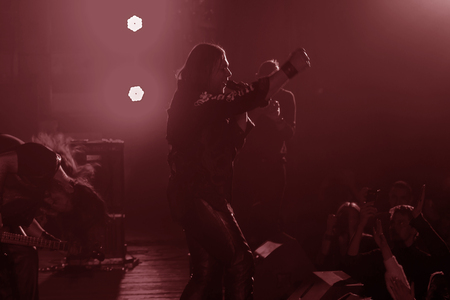 ODESSA, UKRAINE - January 24, 2019: Rock band playing live music on stage. Ivan Voron and the Beast are invited to Hard Rock Show. A tough musical event at a live hard rock music festival in Odessaのeditorial素材