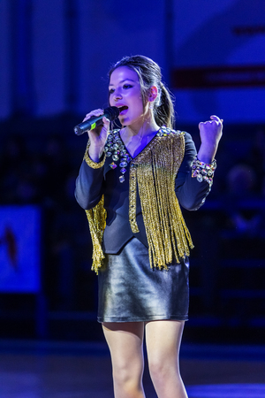 Odessa, Ukraine - February 16, 2019: Children's music groups singing and dancing on basketball court during a commercial break. Children's play. Emotional children's show on stage. Dancing on stageのeditorial素材