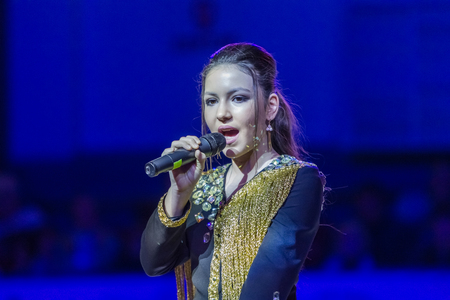 Odessa, Ukraine - February 16, 2019: Children's music groups singing and dancing on basketball court during a commercial break. Children's play. Emotional children's show on stage. Dancing on stageのeditorial素材