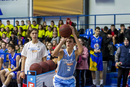 Odessa, Ukraine - Feb. 16, 2019: Sporting holiday children's basketball school league. Teenagers play basketball, participate in children's sports competitions during celebration of children's clubのeditorial素材