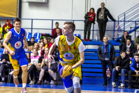Odessa, Ukraine - Feb. 16, 2019: Sporting holiday children's basketball school league. Teenagers play basketball, participate in children's sports competitions during celebration of children's clubのeditorial素材