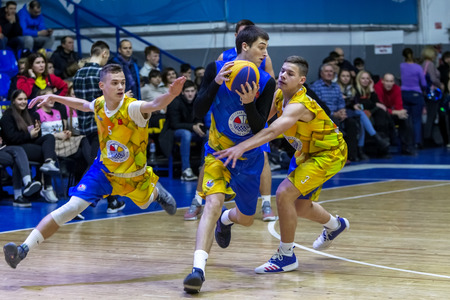 Odessa, Ukraine - Feb. 16, 2019: Sporting holiday children's basketball school league. Teenagers play basketball, participate in children's sports competitions during celebration of children's clubのeditorial素材