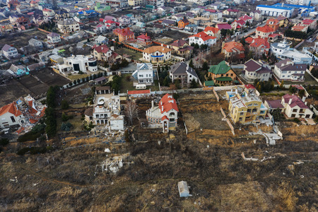 Landslide caused by rains of hurricane destroyed expensive cottages and houses. Destroyed house,...
